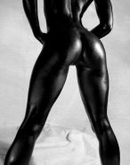 Model in a photo entitled Black Chrome, shot by a US photographer publishing under the alias J Point Photography. You can see this photo in a less cropped version for example here: http://www.modelmayhem.com/portfolio/pic/42512940, more of his photos for example here: http://www.adulttalentlist.com/albumview.php?user_id=364&id=358 or at ModelMayhem: http://www.modelmayhem.com/portfolio/1587510/0 --- The model could be perhaps Kerbi Simone (http://www.modelmayhem.com/eyesofsmith) or C Sugar (http://www.modelmayhem.com/iinspireu) - those are two black models working with J Point, but I could not verify whether it is one of them, or another one.