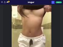 Whats the name of this girl in a bathroom with sweatpants?