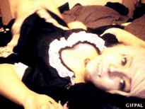 Who is woman with fangs in the gif from the website Motherless category PetPlay