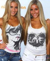 Becky & Milly Rosso  http://www.bigstockphoto.com/image-36029758/stock-photo-lollipop-theater-network-3rd-annual-game-day