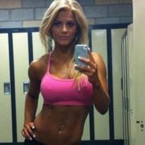 Jessica King, wearing same belly ring:  http://www.picstopin.com/612/jessica-king-in-a-pink-bikini-getting-ready-for-show/http:%7C%7Ci*imgur*com%7CJWC6K*jpg/