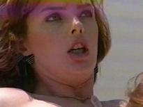 This is Lauren Brice and she is in this scene with Tianna Taylor. 

This is featured in Green Serrano 1 but this is a compilation film. 

The original film is called Bat Bitch 2 1991 

https://www.iafd.com/title.rme/title=bat+bitch+2/year=1991