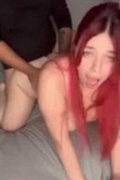 What is the name of this redhead babe?