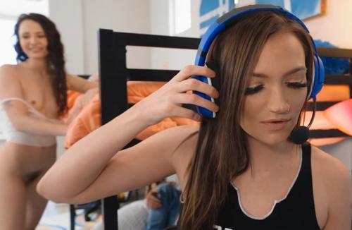 On the left is Liz Jordan but who is the girl in the headset?